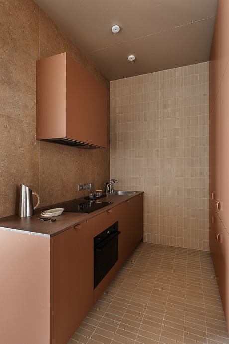 Limestone Project Uses Earth Tones to Shape Quiet Guest Rooms Inside - 7