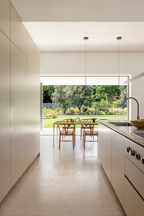 Arco House: A Madrid Home Shaped Around Art, Color, And Garden - 6