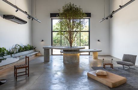 Casa Flairs: Brutalist Concrete Volumes Organize a Flexible Office