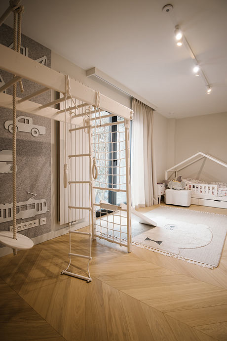 Pigwy Residence Shapes a Quiet Domestic Mood Through Marble and Oak - 5