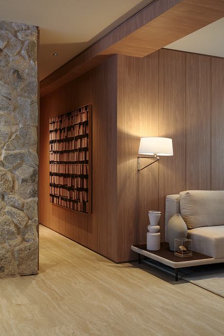 Cerâmica Apartment Shapes Calm Interiors Through Warm Stone and Wood - 7