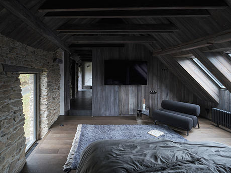 Cottage a Vysočina Recasts The Attic With Dark Timber - 8