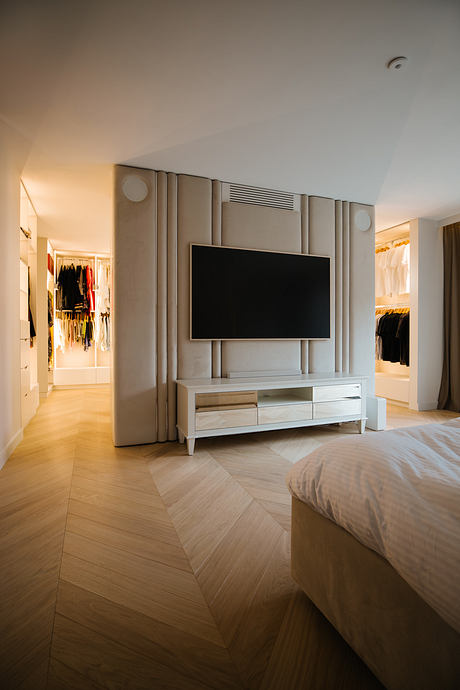 Pigwy Residence Shapes a Quiet Domestic Mood Through Marble and Oak - 7