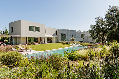 Arco House: A Madrid Home Shaped Around Art, Color, And Garden - 14