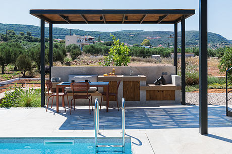 Rizes Villas Extends Local Stone Across Cottage Living - 8