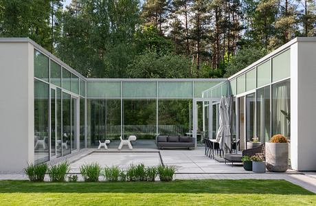 Residential House in Vilnius: Three Volumes in the Forest